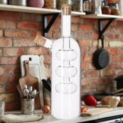 Merkloos Decopatent® 2in1 Olie En Azijnstel Glas - Bolvorm Met Kurken - Glazen Azijnfles & Oliefles In 1 - Oil And Vinegar - 9 X 9 X 21 Cm 12 Merkloos Decopatent® 2in1 Olie En Azijnstel Glas - Bolvorm Met Kurken - Glazen Azijnfles & Oliefles In 1 - Oil And Vinegar - 9 X 9 X 21 Cm -KitchenAids Winkel 1200x1200 1038